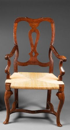 Walnut armchair, 18th century, Modena