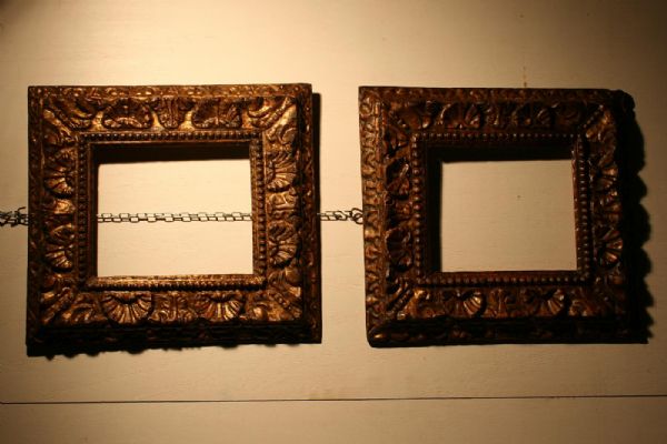Pair of carved and gilded frames' 500